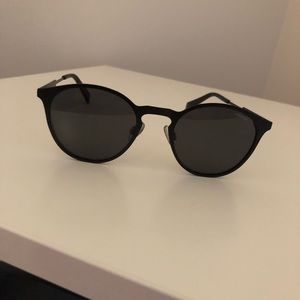 Black round sunglasses - Polaroid Eyewear